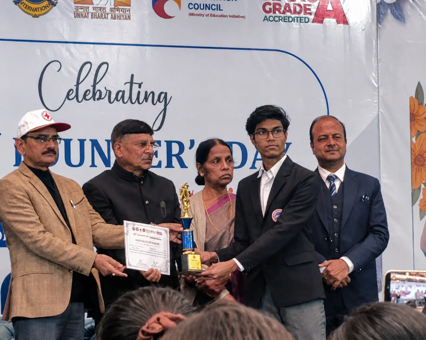 Himanshu Raj receiving Founders Day innovation award for AI implementation in business